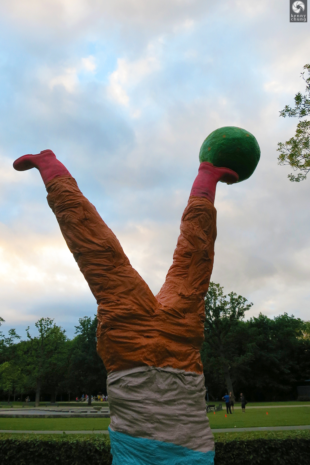 Closeup of the boy kicking a ball art sculpture in Vondelpark.