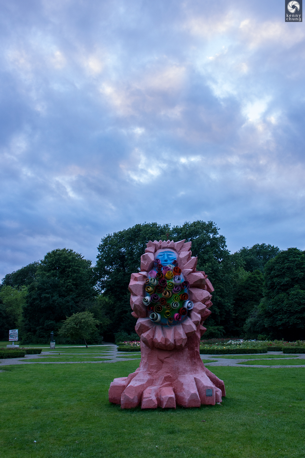 Flowers and a foot statue art piece at Vondelpark