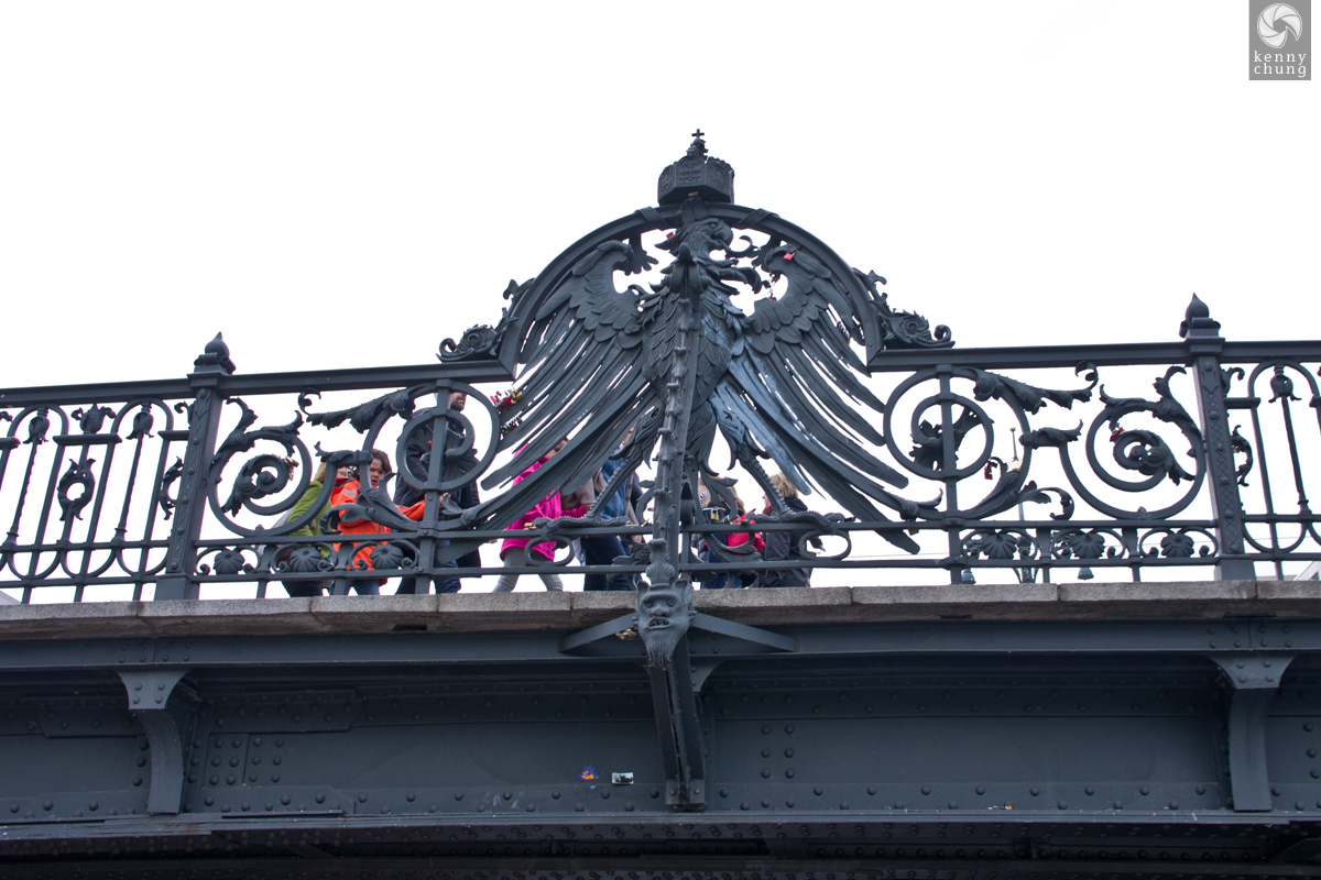 An iron imperial eagle on the Weidendammer Bridge in Berlin