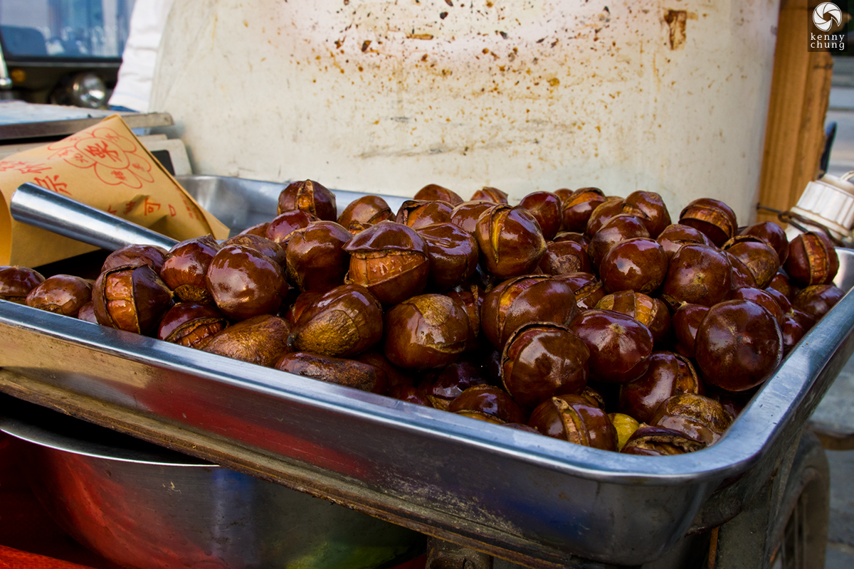 Charcoal roasted chestnuts outside the Beijing Olympic village