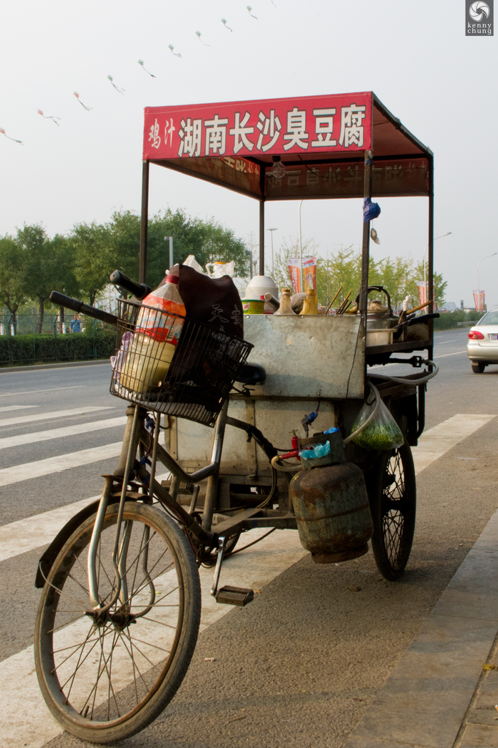 A street food bicycle outside the Beijing Olympic village