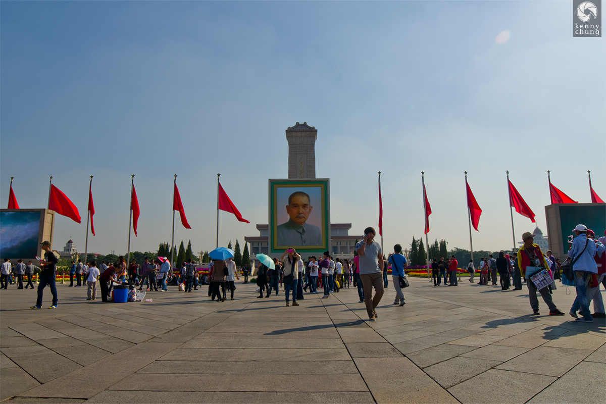 A portrait of Sun Yat-sen in front of the Monument To The People's Heroes