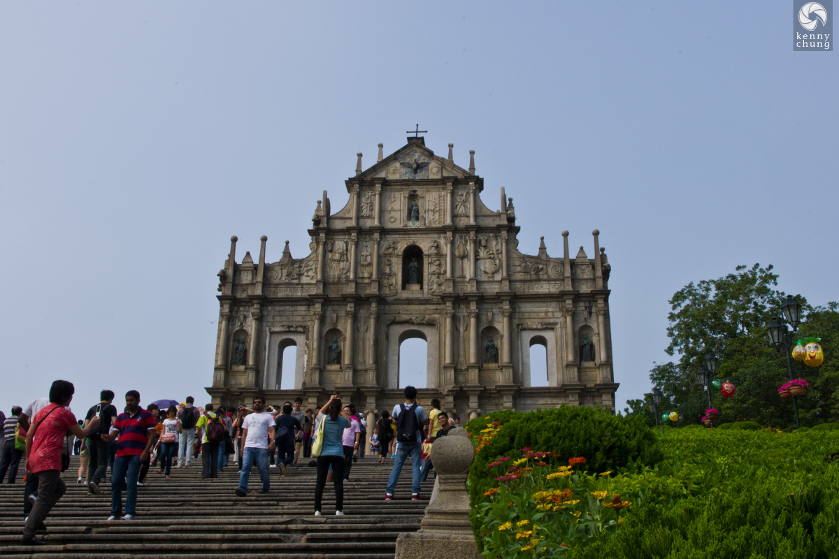 Tourists taking photos at the Ruins of St. Paul's in Macau