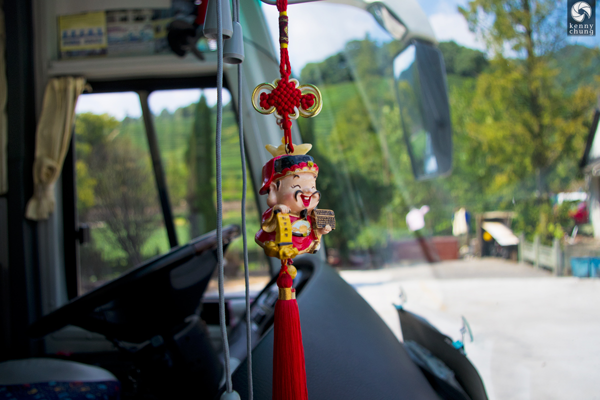 Chinese god of wealth doll rearview mirror charm in Shanghai