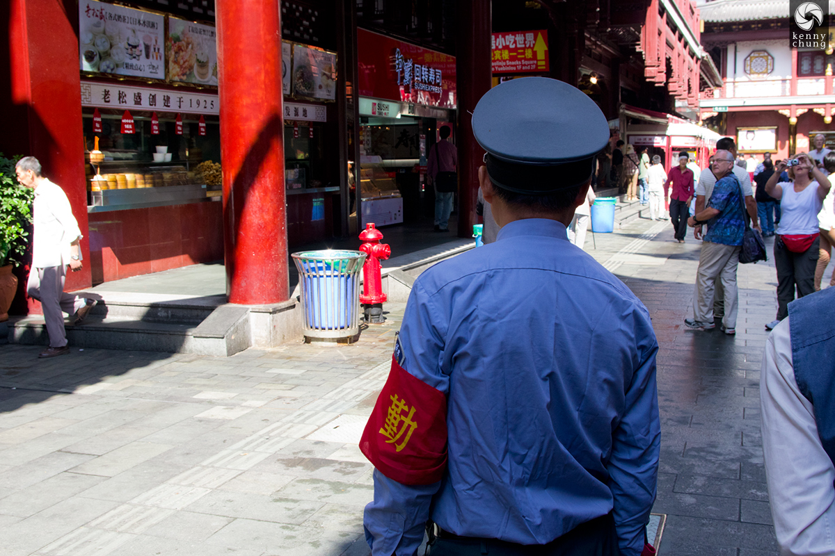 Security guard at Yuyuan Bazaar Shopping Center in Shanghai