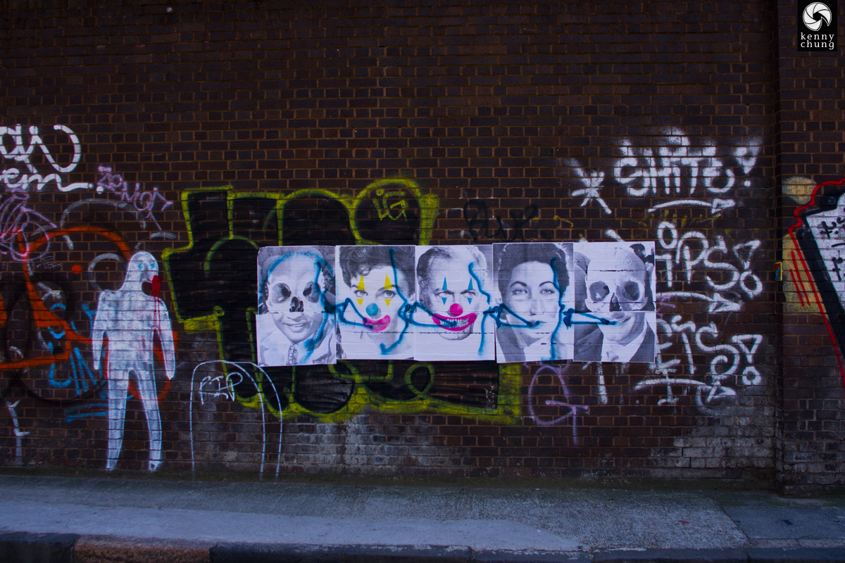 Wheatpaste clown street art in Shoreditch, London