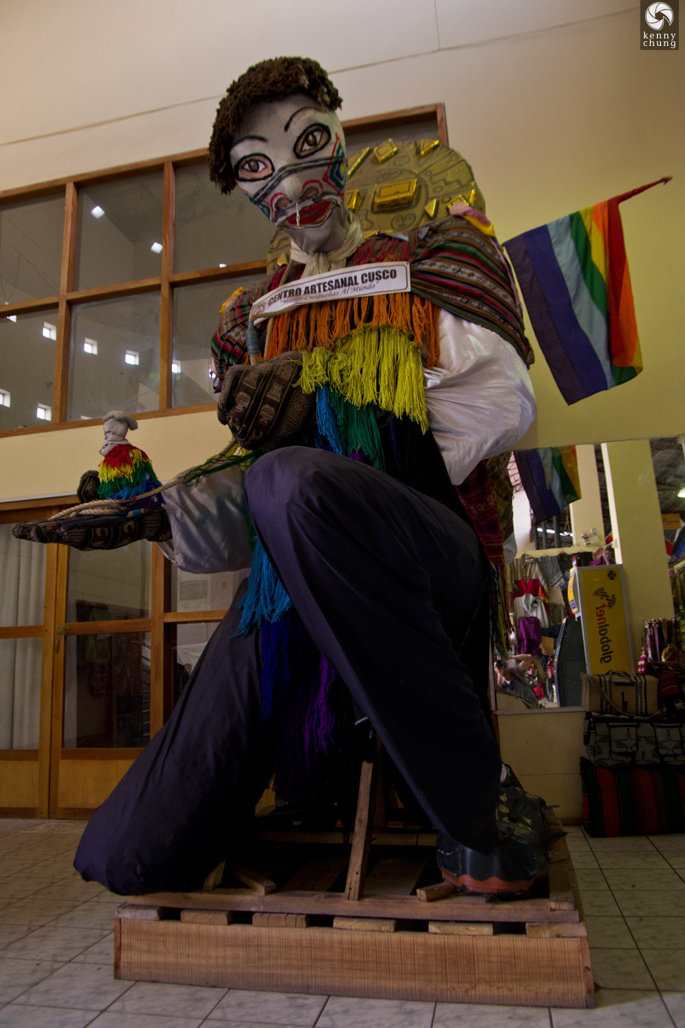 A masked mascot at Centro Artesanal Cusco